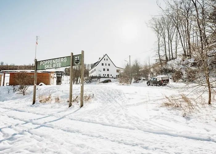 Q-stall, 04 Feriehus